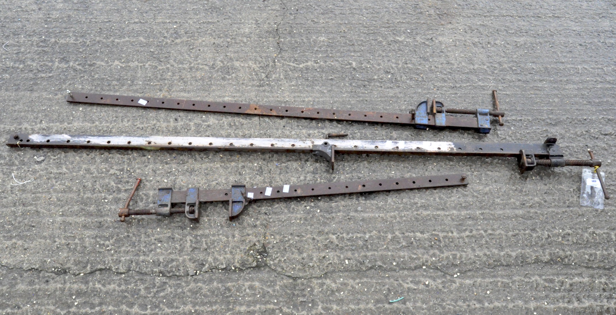 Three metal clamps, one example by Record,