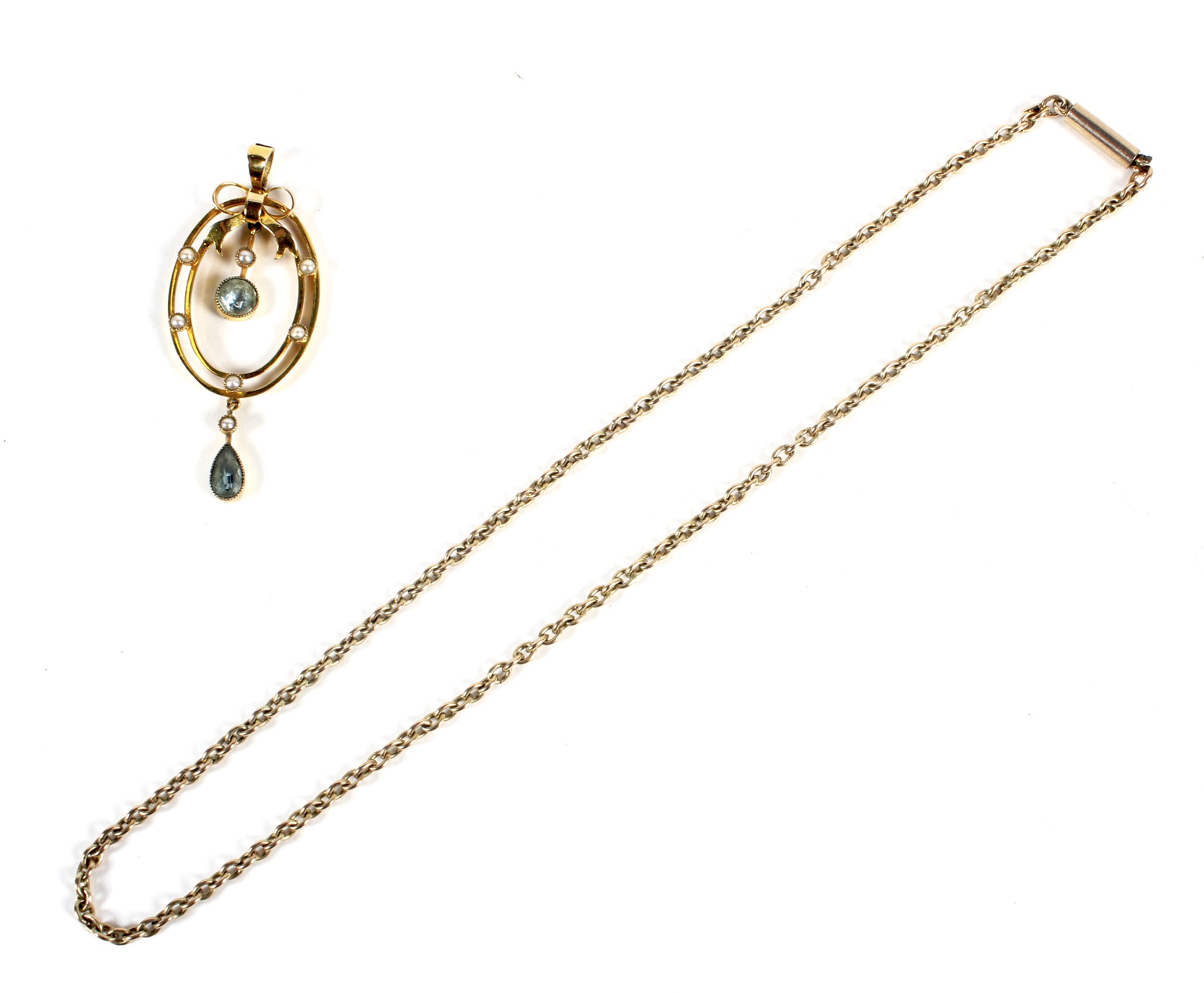 An Edwardian 9ct gold pendant, open oval design with a bow,