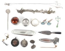 A collection of 20th Century silver collectables, including a mother of pearl fruit knife,