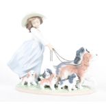 A Lladro Priviledge 'Puppy Parade' boxed figure group, printed blue marks, LZ78E, impressed 6784