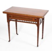 A Victorian Aesthetic style mahogany and walnut card table,