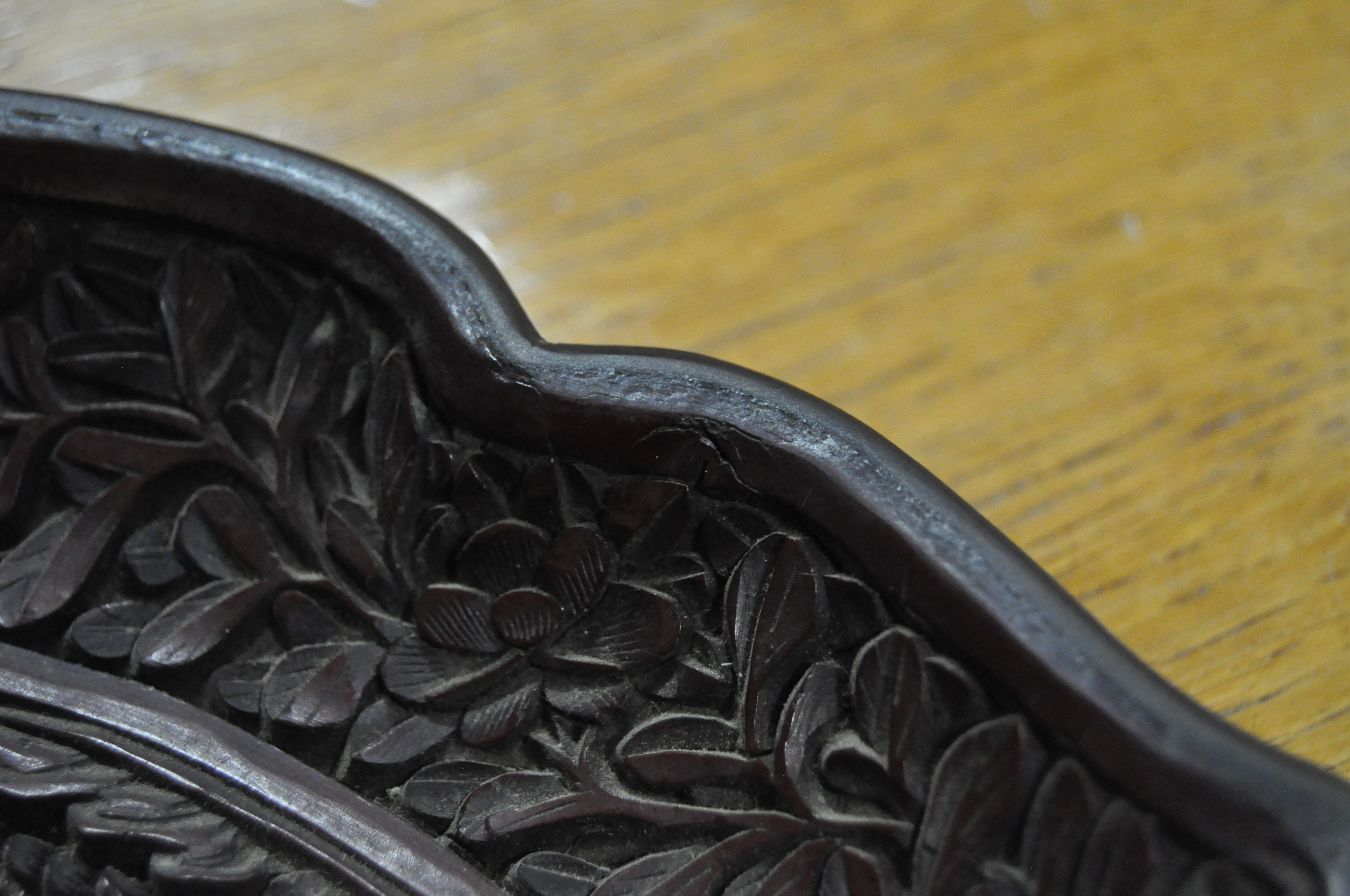 A Chinese carved cinnabar lacquer dish, 19th Century with 18th Century mark, - Image 8 of 12