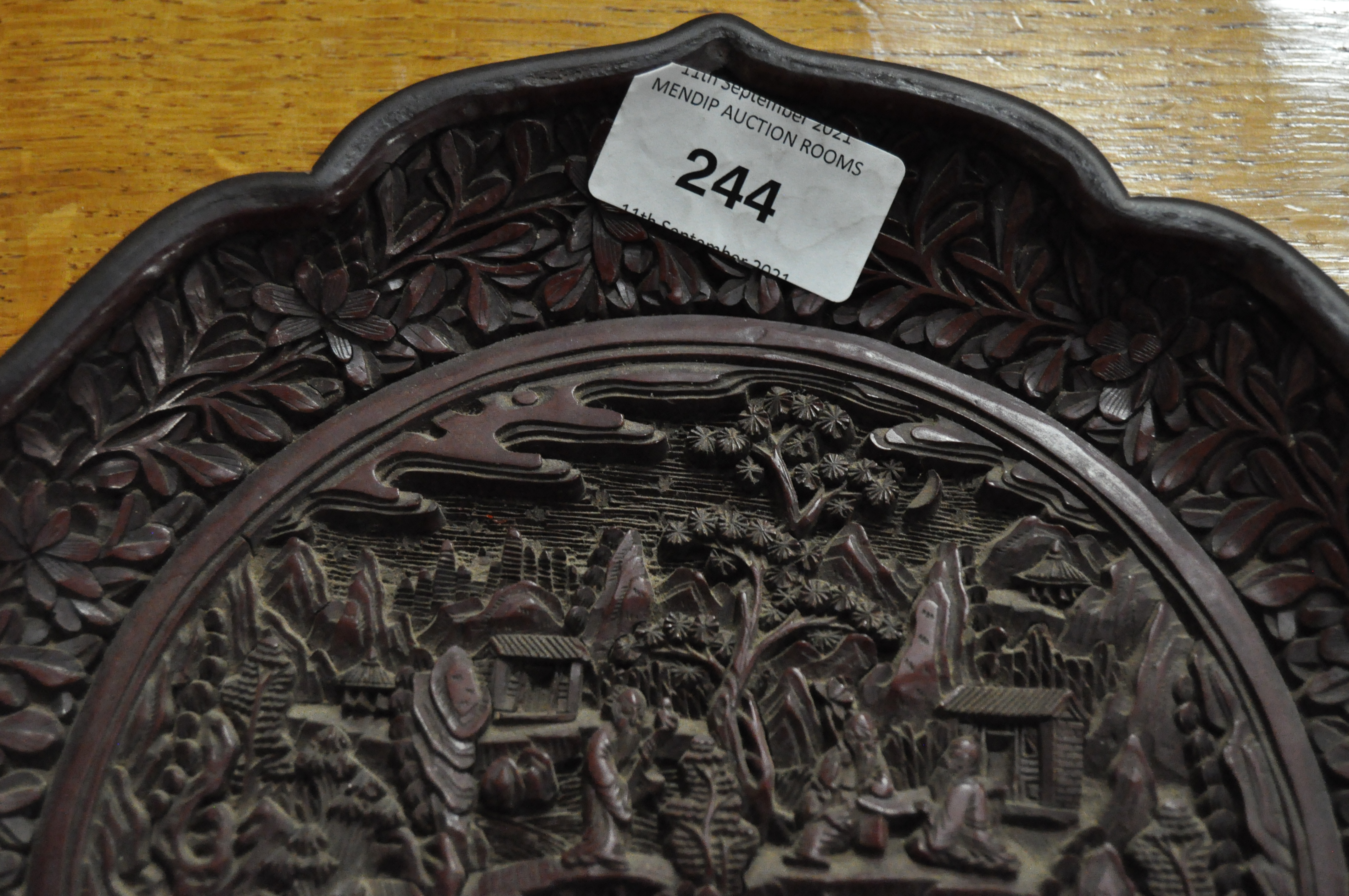 A Chinese carved cinnabar lacquer dish, 19th Century with 18th Century mark, - Image 7 of 12