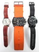 Three modern wristwatches, including; Gents Fossil 10-ATM stainless steel cased on rubber strap,