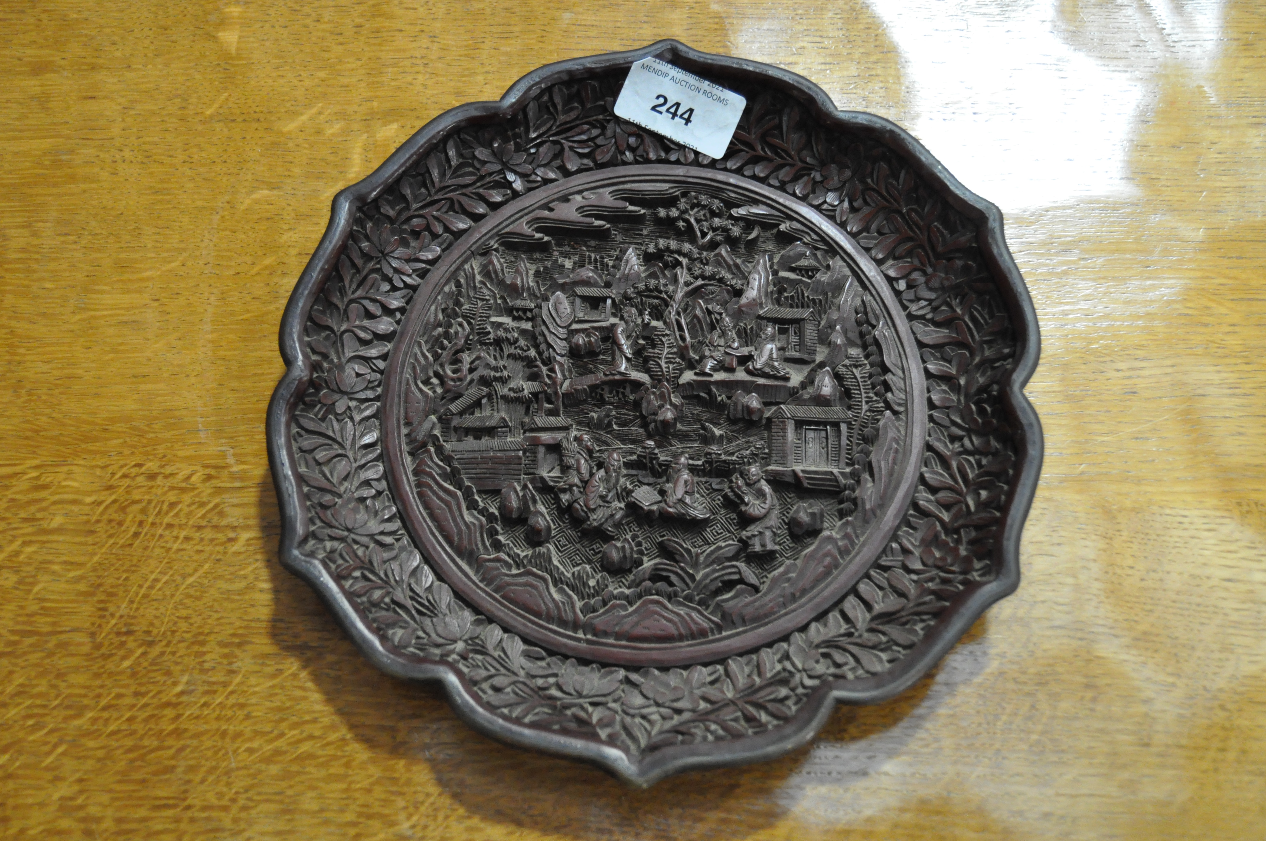A Chinese carved cinnabar lacquer dish, 19th Century with 18th Century mark, - Image 3 of 12