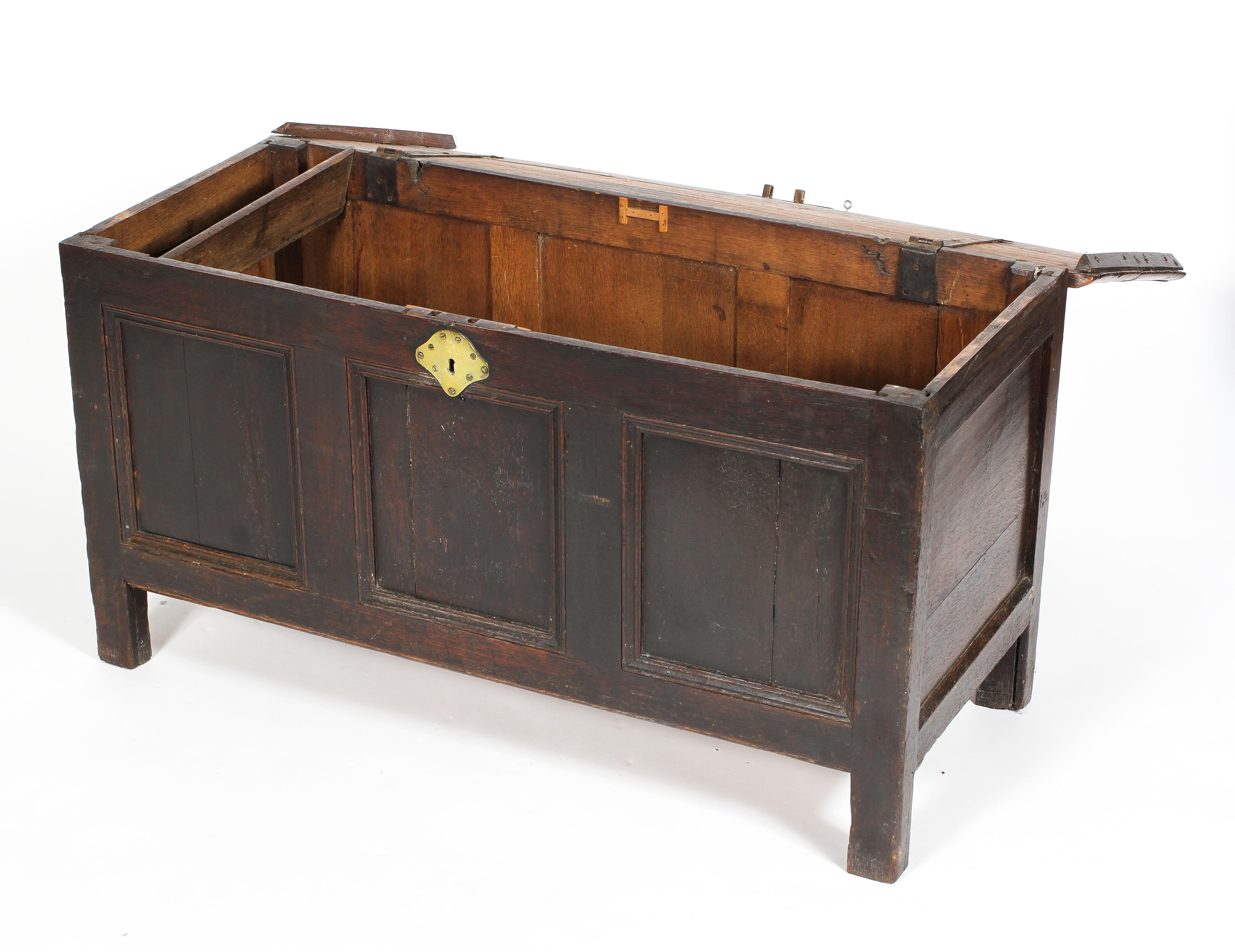 An oak coffer, late 17th or early 18th century, candle box interior and triple panel front, - Image 2 of 2
