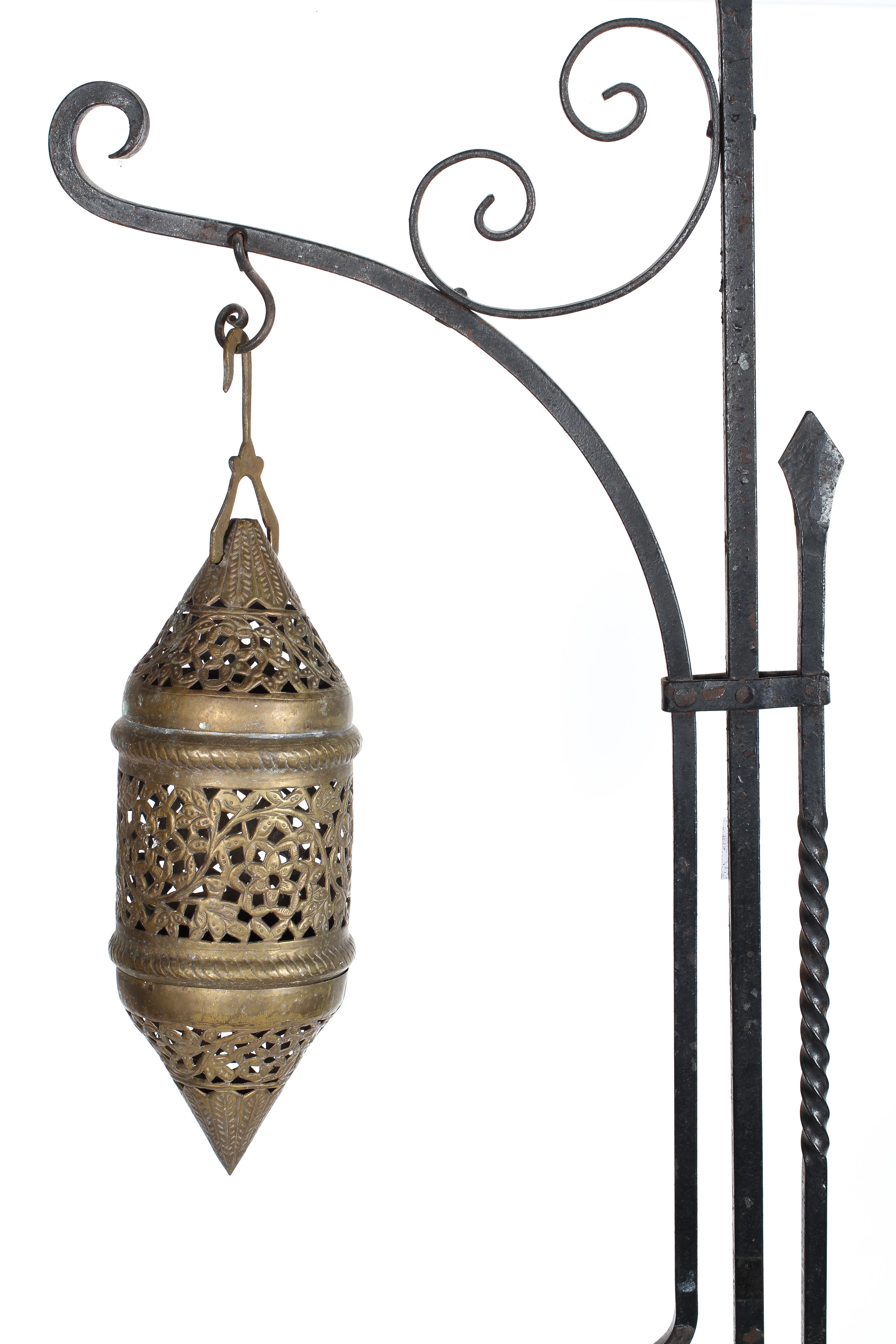 A Middle Eastern brass pierced lantern with pierced floral decoration, and wrought iron stand, - Image 2 of 2