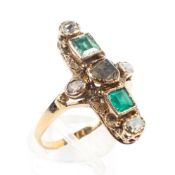 A yellow metal abstract ring. Set with one square cut emerald and one green chalcedony.