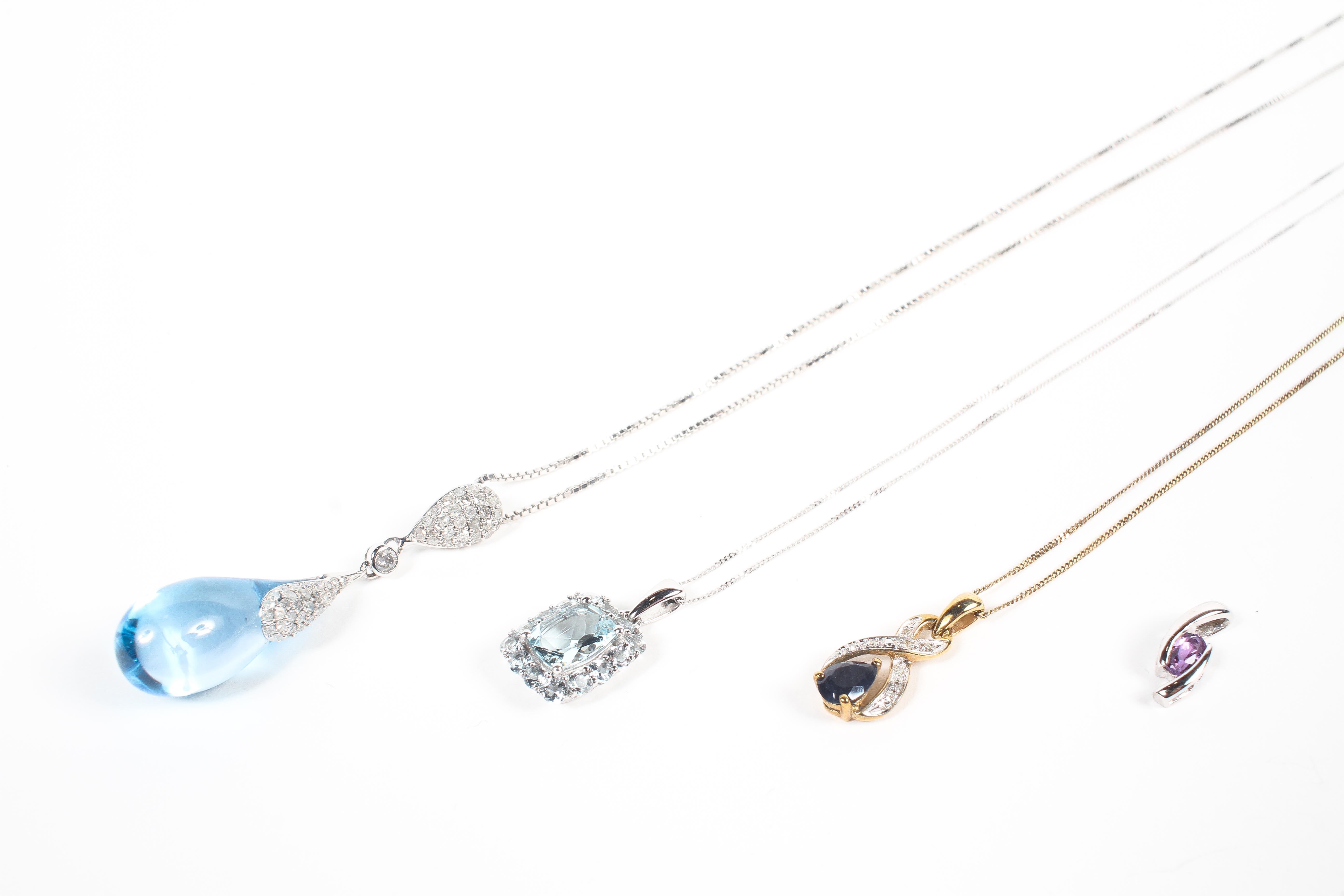 A collection of three gold gemstone and diamond pendants together with a white gold amethyst pendant - Image 2 of 2