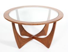 A G-Plan glass topped teak 'Astro' coffee, mid-century, with circular top,