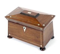 A Victorian mahogany tea caddy, of sarcophagus form,