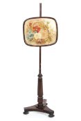 A 19th century mahogany and tapestry pole screen,