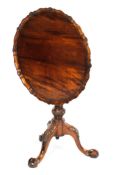 A Georgian style mahogany circular tilt top table, 20th century,