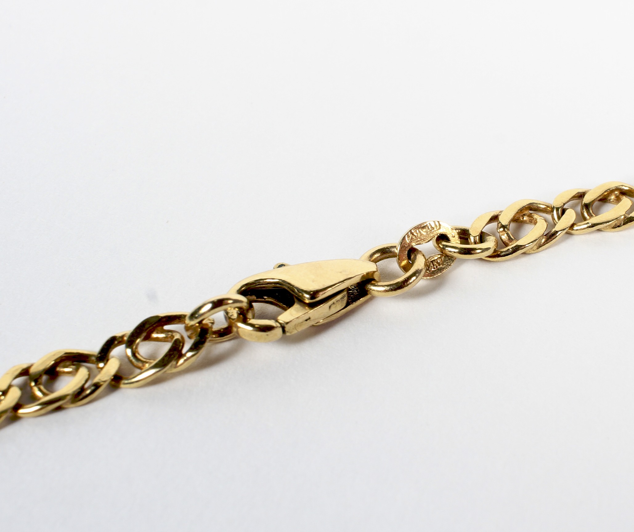 A yellow metal neck chain, stamped Italy, 14kt, 15. - Image 2 of 2