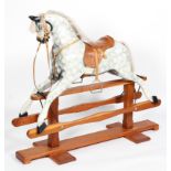 A modern rocking horse by Lusal, dappled grey with grey mane and tail,