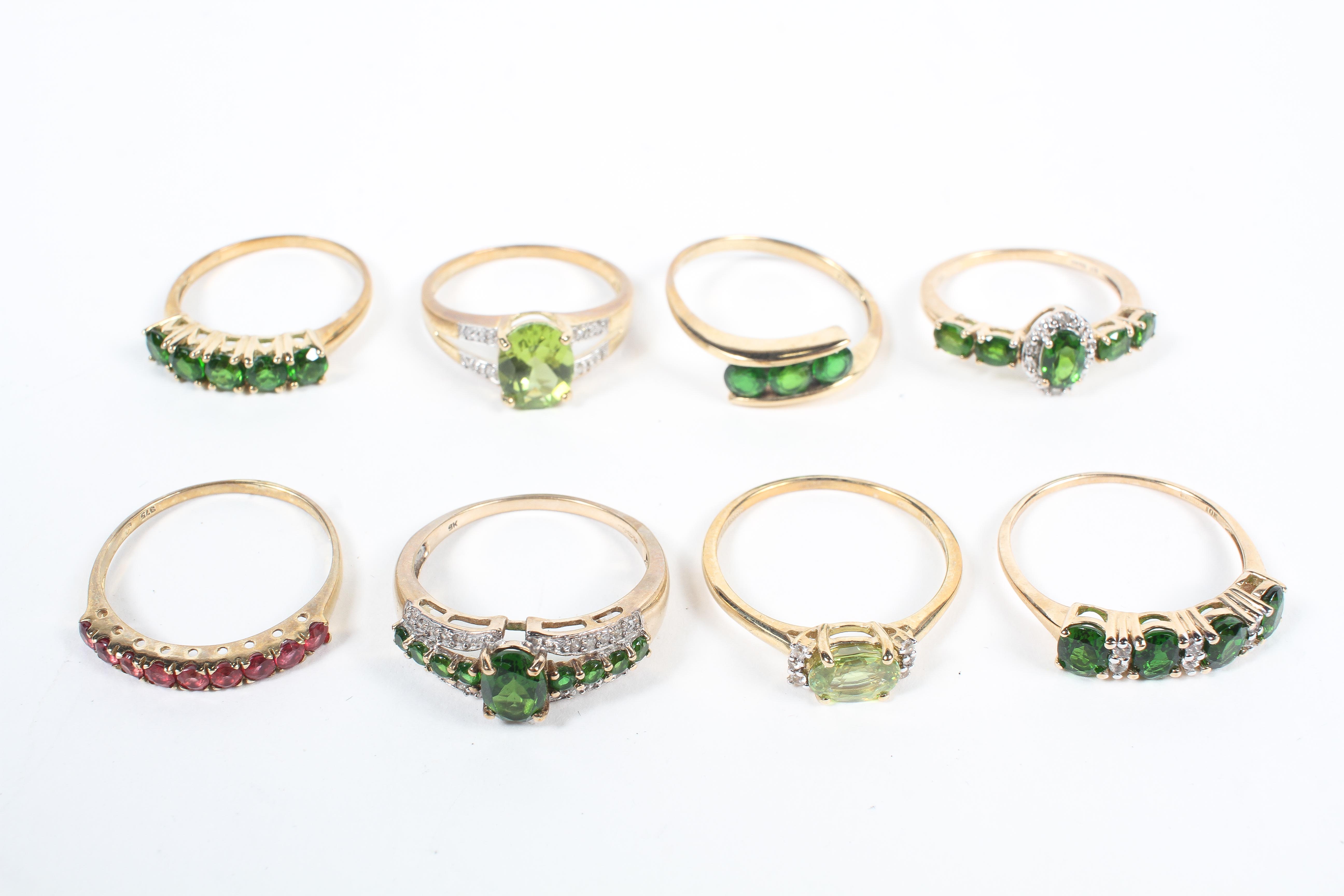 A collection of eight gemstone set dress rings,