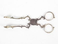 A pair of silver sugar tongs, late 18th/early 19th century,