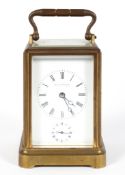 A French brass carriage alarm clock, the enamelled dial inscribed Klaftenberger, Regent Street,