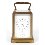 A French brass carriage alarm clock, the enamelled dial inscribed Klaftenberger, Regent Street,