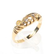 A yellow metal dress ring set with old cut diamonds (centre stone is missing) Hallmarked 18ct gold,