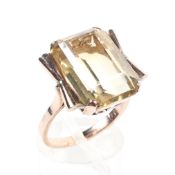 A 9ct citrine ring, 16mm x 12mm approx, in a yellow metal mount,