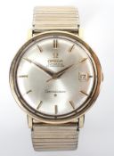 A gold plated Omega automatic chronometer constellation wristwatch.
