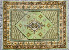 A Turkish Green ground rug, possibly Ushak,