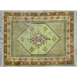 A Turkish Green ground rug, possibly Ushak,