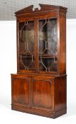 A George III style mahogany bookcase,