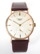 A Longines wrist watch, with subsidiary seconds dial, baton numerals, manual wind,