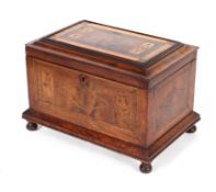 A 19th century walnut and inlaid work box, inlaid with lozenge shapes and stringing,