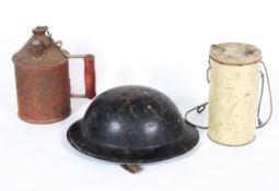 A World War II Brodie Helmet, marked R twice, together with a gas mask marked LOT 474A/ L&B.R.CO.