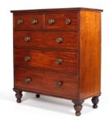 A Victorian mahogany chest of drawers, with two short drawers above three graduated long drawers,