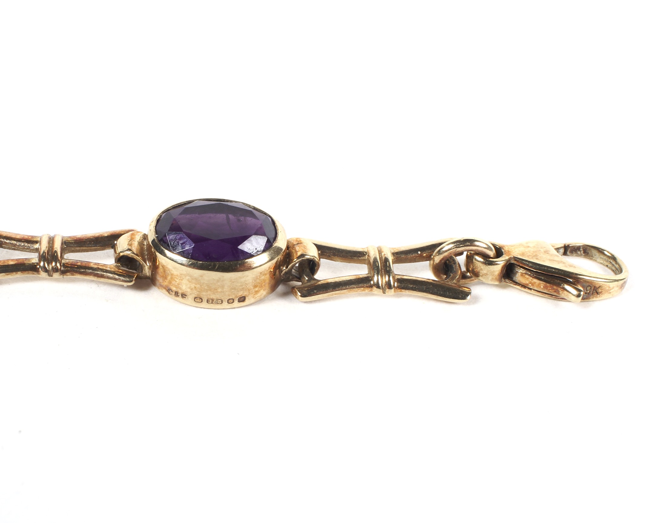 A 9ct gold and amethyst mounted bracelet, - Image 3 of 3