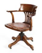 A Victorian mahogany desk or captain's chair, with pierced splats,