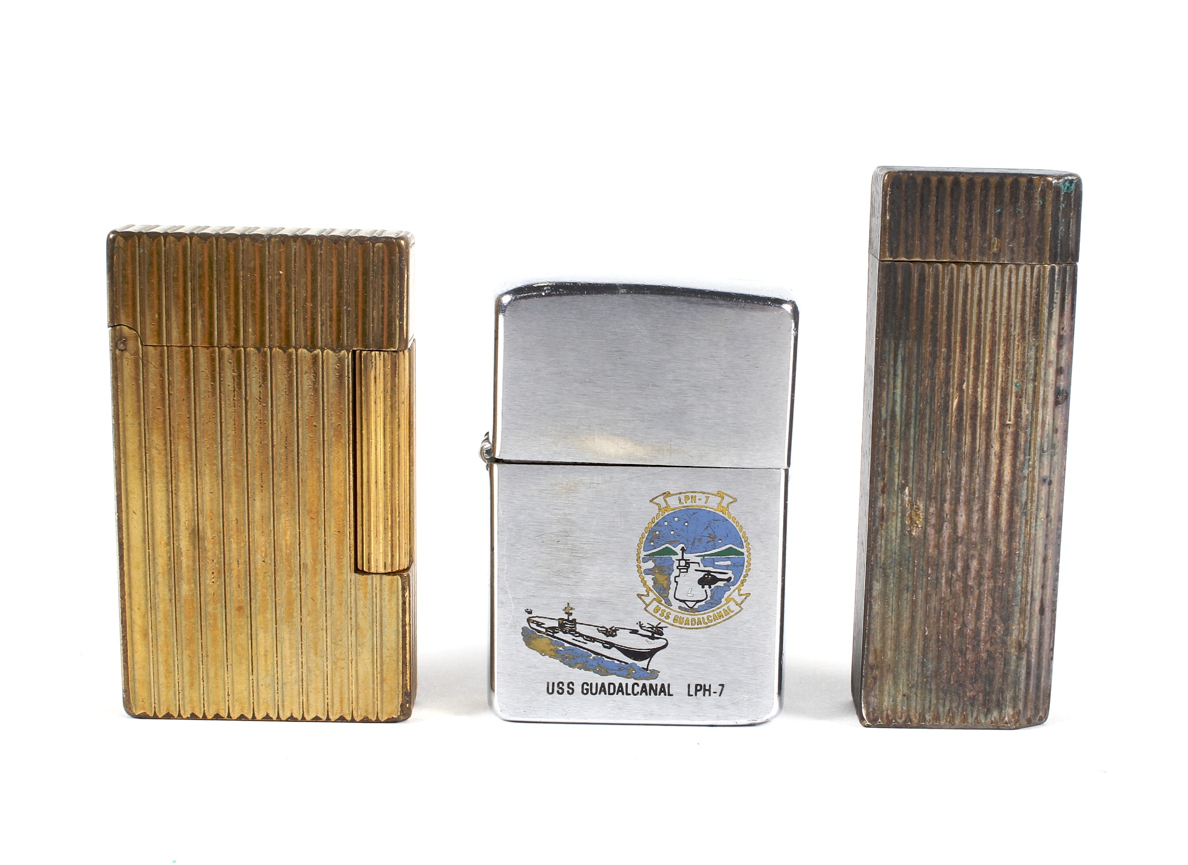 A selection of three vintage lighters, comprising a St Dupont, no 85AHB341,