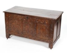 A carved oak coffer, 17th century,