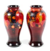 A pair of Moorcroft baluster Leaf and Berry Flambe vases, circa 1934,