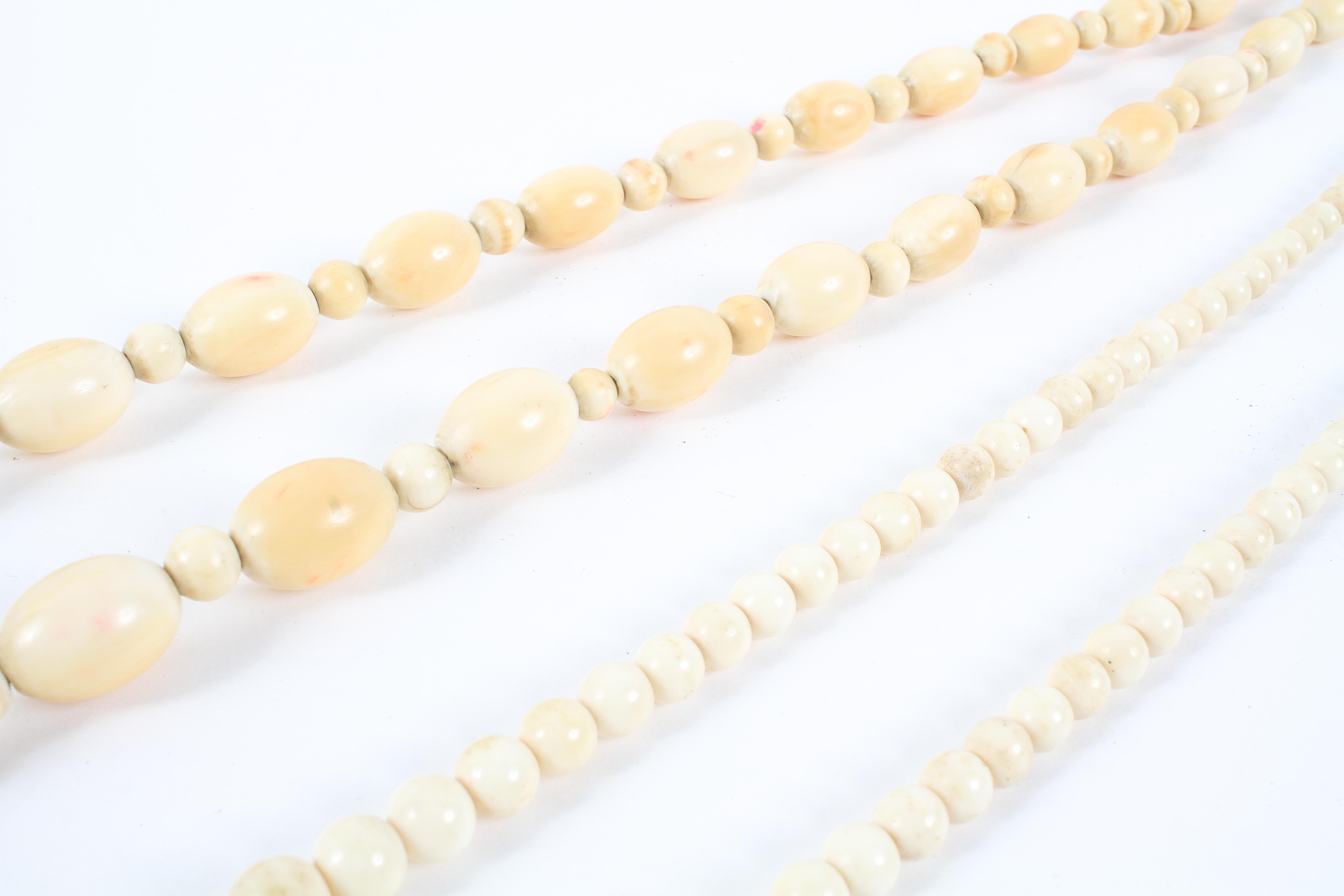 Two early 20th century ivory necklaces of graduated beads - Image 2 of 2