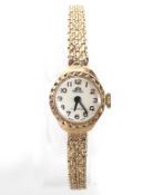 A vintage ladies Chevalier 9ct gold wristwatch with 9ct gold bark effect strap, 17 jewel movement,