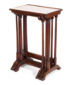 An Edwardian mahogany nest of three tables, with cross banding and stringing to top,