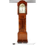 A mahogany and walnut long case clock, the 11" painted dial with floral spandrels,