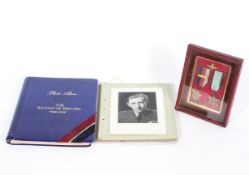 A set of two framed Battle of Britain medals and extensive information, photos and albums