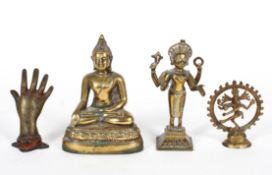 A South East Asian brass standing deity with four arms, 17cm high; a brass buddha,