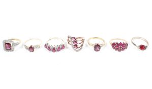 A collection of seven gemstone set dress rings