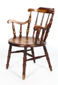 An elm penny seat Windsor chair, late 19th century,