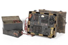 A WWII SOE spy transmitter,a battery and spares, the cased transmitter Type A, MK III,