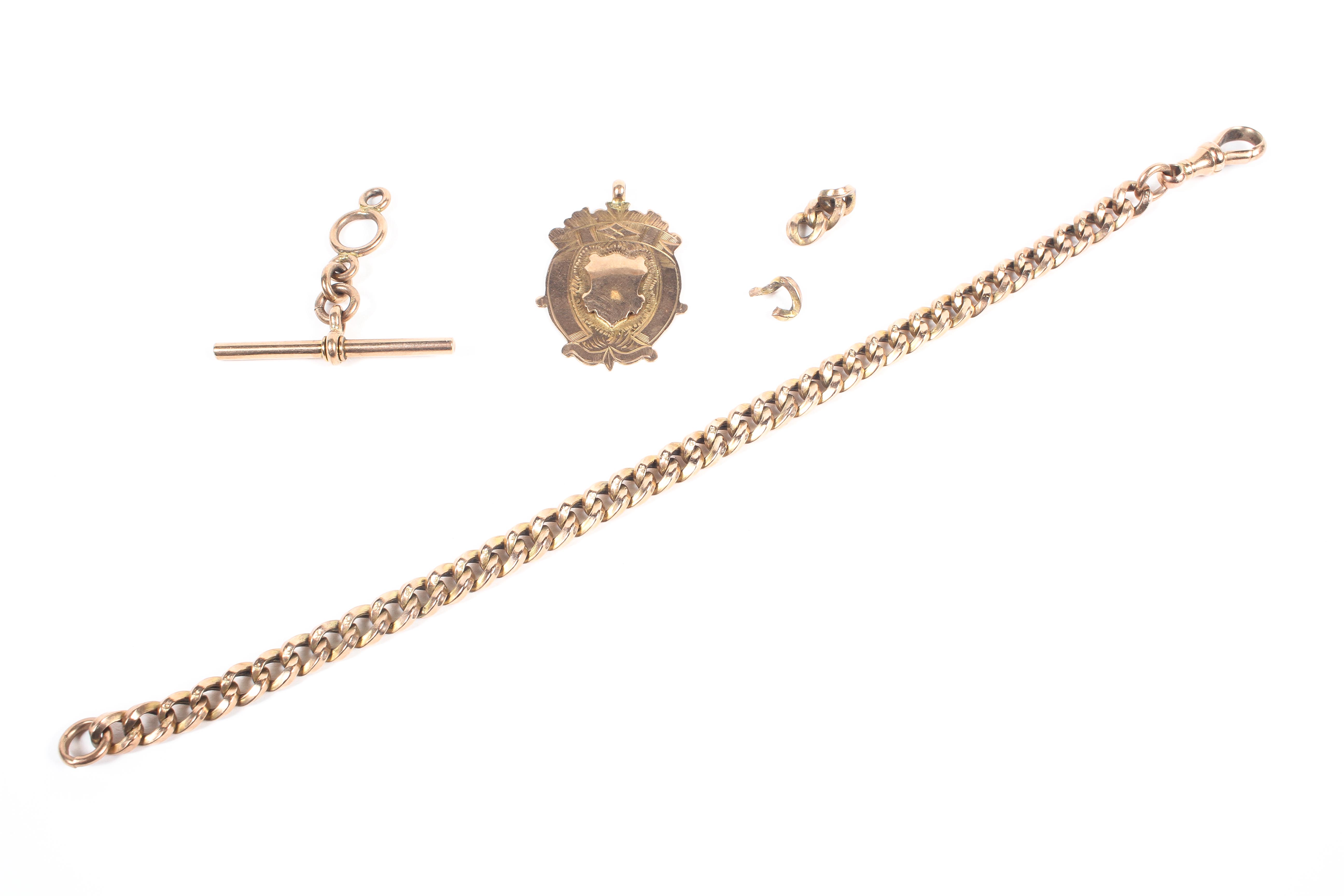 A yellow metal bracelet, each section stamped 9c; with a 9ct gold hallmarked medallion and a T-Bar,