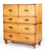 A Victorian oak campaign style secretaire, in two sections,