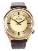 A Bulova Accutron vintage gents wristwatch, the two tone dial with batons denoting hours,